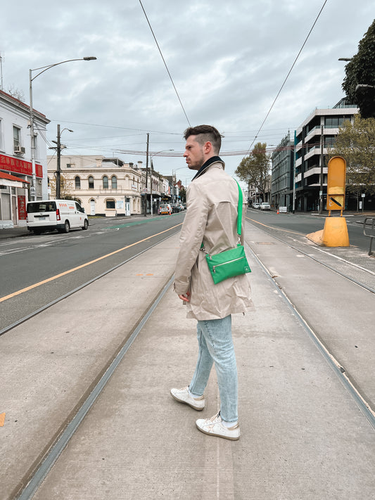 Divaska's water-resistant nylon crossbody bag in green - Front view